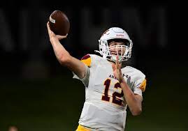 Junior QB JJ Kohl throws a pass against Dowling Catholic. 