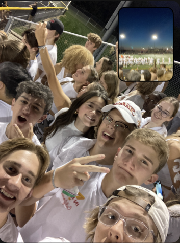 Shown here is a BeReal posted by AHS senior Drew Taylor with fellow AHS students at a football game.