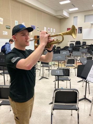 Senior Sam Stember plays  trumpet in the band room after school. His main instruments are tuba and bass trombone.“The fact that Sam is such a talented musician and the fact that he can play equally as good on bass trombone in Jazz Ensemble as he can on tuba in Concert Band and sousaphone in Marching Band [demonstrates how] Sam is a well-rounded, versatile musician,” Jennifer Williams, head director of Ankeny High School Bands, said.  