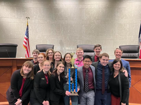 The Miller-Metzger Academy with their coaches. From left to right: Stephanie Gray, Hannah Pross, Nicki Casady, Sareena Casady, Marissa Larson-Minar, Mallory Jordan, Hayden DeWitt, Chloe Andersen, Grant Miner, Marcus Miller, Noah Yeager, Joe Metzger, Raegan Hansen, Amy Akers. 
