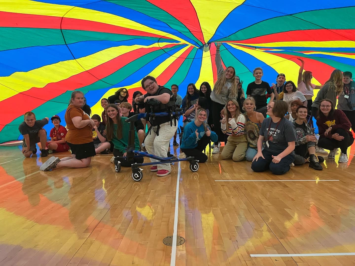 It is parachute day in P.E.O.P.E.L. P.E. class. Students who want to make a difference, make new and true friends, or to try a different physical education credit can take P.E.O.P.E.L. P.E. and/or join Circle of Friends. The next Circle of Friends event will be kickball from 4-5 p.m. at Miracle League Park in Ankney