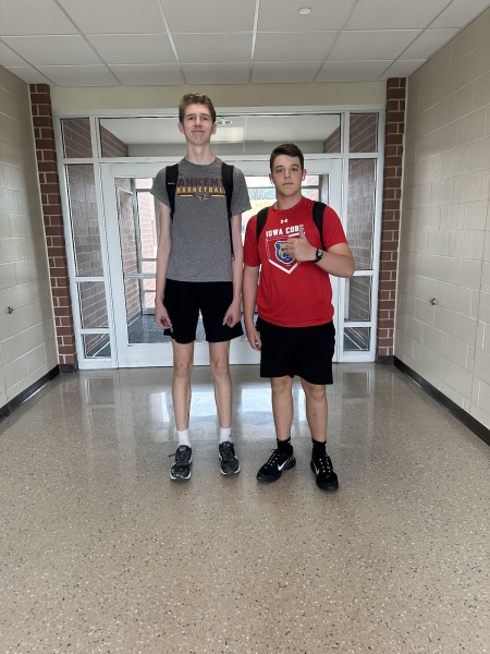 Sophomore Max Allison stands at 7-feet tall next to 6-foot tall junior Ryan Tomlinson.