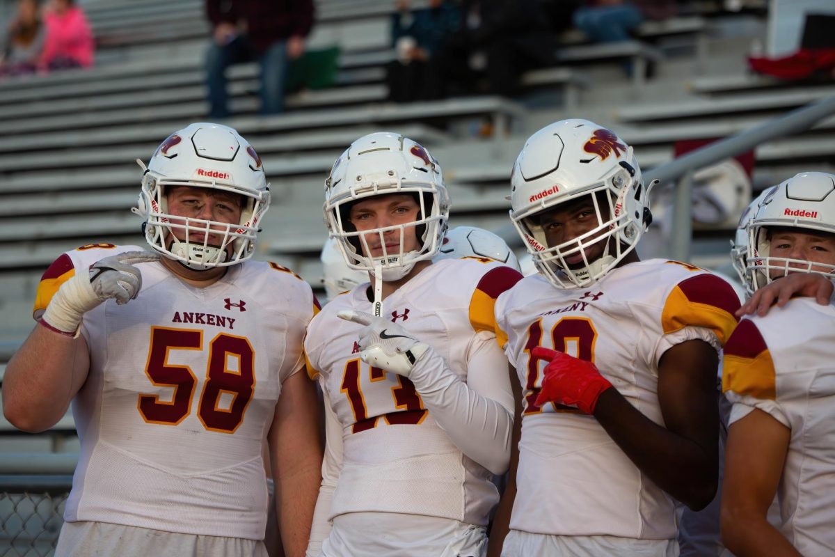 The Thursday, October 24th Ankeny vs Cedar Rapids Washington game was postponed, and the Ankeny Hawks returned to Cedar Rapids the next day for the final regular season matchup. Senior Landen Rutter (58), junior Andrew Brandhorst (13), and junior Emanuwel Ford-Davis (18), ready for action.
