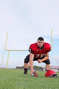 A senior photo from coach Betten’s senior football season.

