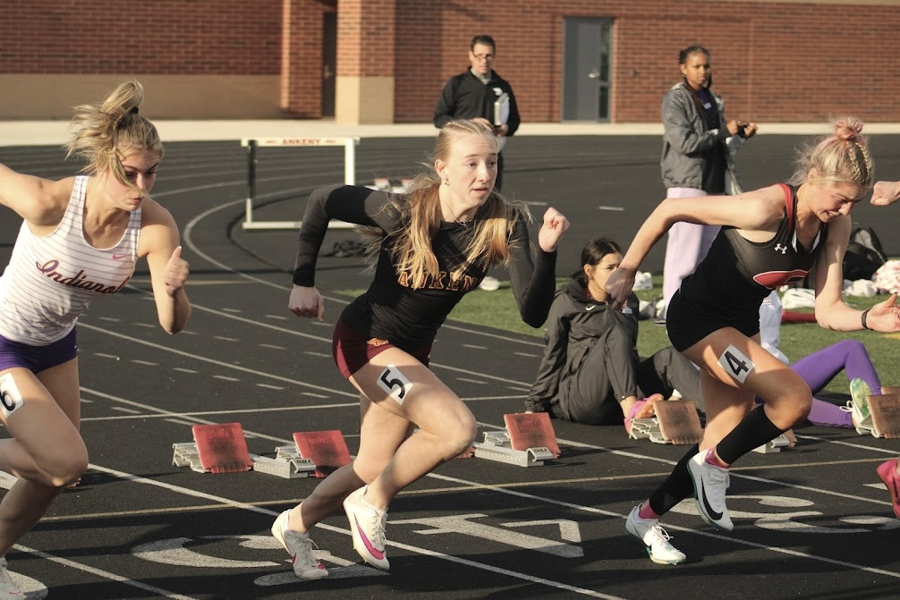 Ankeny freshman Morgan Fisher comes out of the blocks in the 100 meter dash during an April 3 meet at Northview Middle School. Fisher will compete in the 400 meter dash, 4x100 meter relay, and 4x400 meter relay for the Hawkettes at the Drake Relays.
