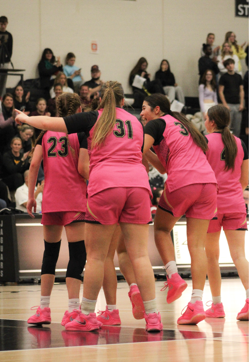 Ankeny’s starters celebrate a big play against crosstown rival Ankeny Centennial. The Hawkettes won the Dec. 5 matchup 55-39 for their fourth straight win. Photo by Ashley Howard