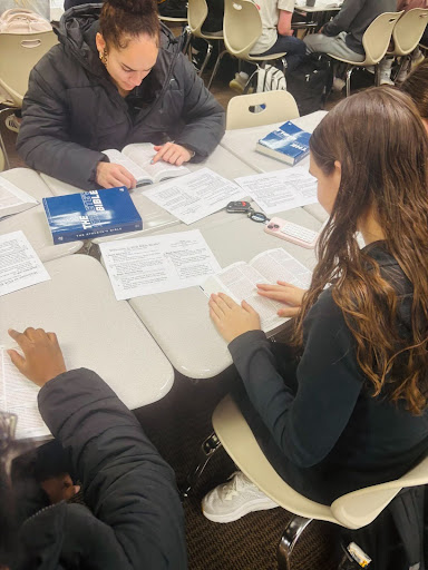 Fellowship of Christian Athletes (FCA) members meet once a week to read and apply Christian scriptures. Reportedly, FCA students would enjoy taking elective courses on religion and look forward to the possibility in the future. Photo by Lily Black.

