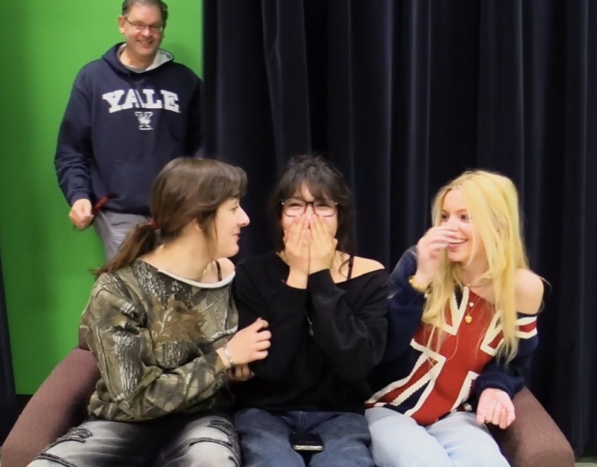 Maddy Sheppard (left), Claudia Galligan (middle) , and Jordan Goemann (right) work on a RAP video for Ankeny High School.